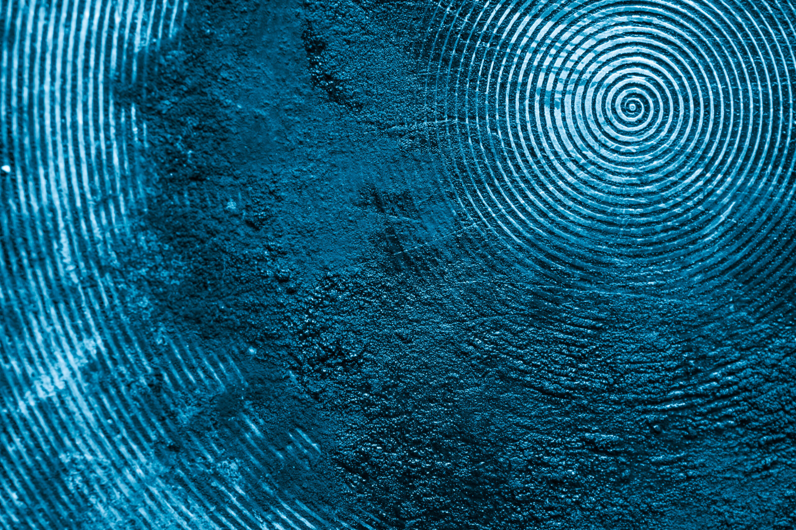 blue old aluminum sheet with burnt marks from the pan